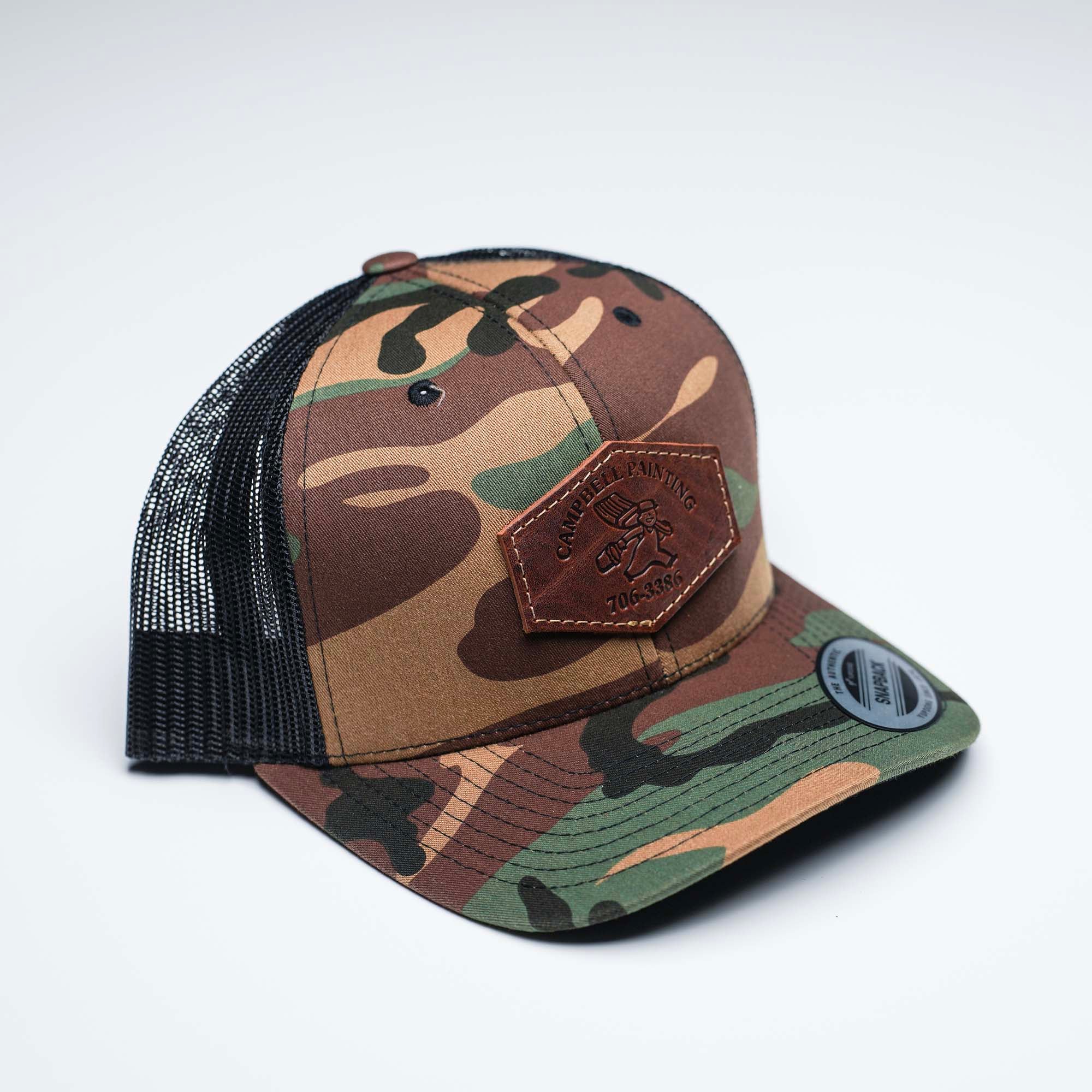 Debossed Heat Pressed - Yupoong 6606 Cap Leather Patch Camo Trucker Hat with YOUR LOGO