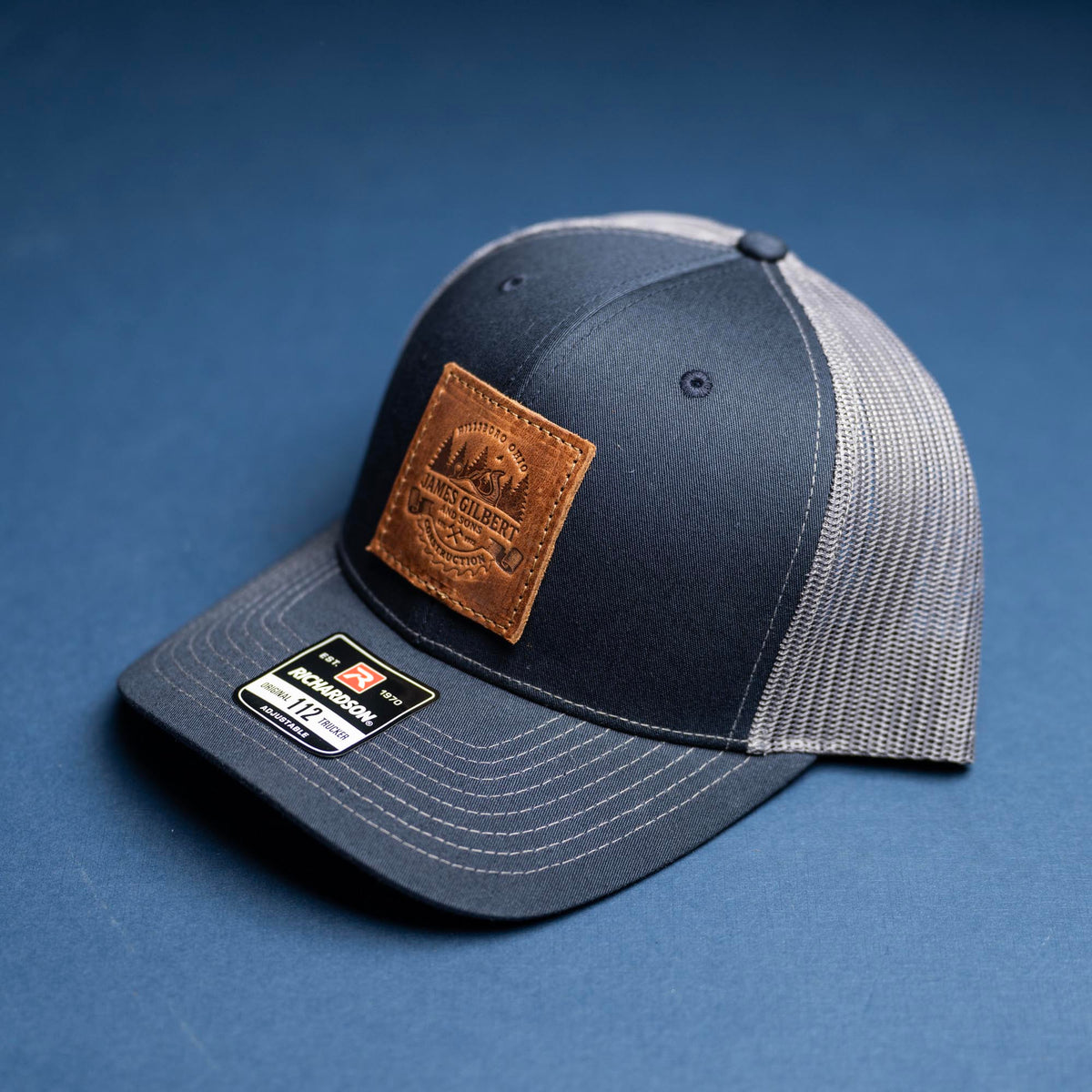 SALE - Debossed Heat Pressed - Navy/Charcoal Richardson 112 Custom Leather Patch Trucker Hat