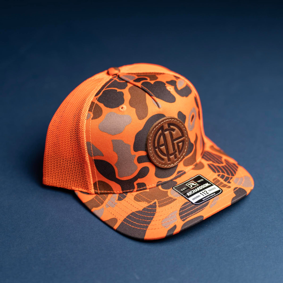 Debossed Leather Patch Trucker Hat - Camo Richardson 112PFP - Customized with YOUR LOGO